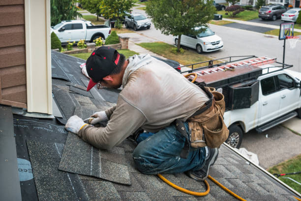 Professional Roofing technician working in Oxford, NC